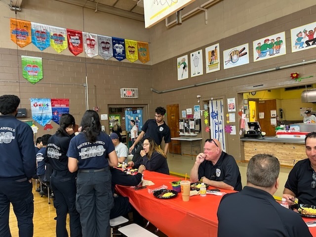 Emergency Service members and town council being provided lunch by Riley School.