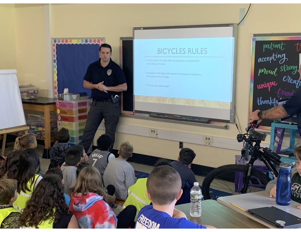 Bicycle safety presentation SRO talking to students