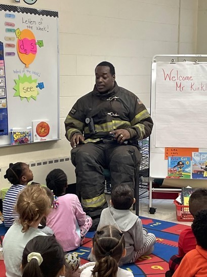 Firefighter Dad, Mr. Curtis Kirland and Mrs. Publik's Kindergarten Class Learning about Fire Safety